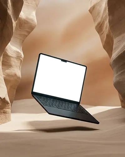 Ultra Slim Macbook Laptop Mockup Floating In Sandy Rocky Canyon With Clean Black Screen