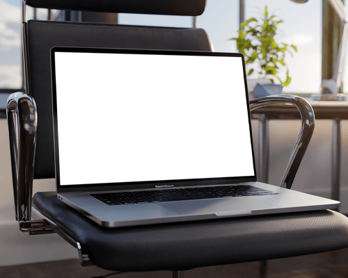 Sleek Macbook Pro M1 On Modern Office Chair With Bright Natural Light And Stylish Background Showcasing Design In A Contemporary Setting