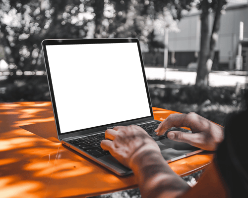 Shaded Outdoor Macbook Mockup Natural Lighting With Typing Hands