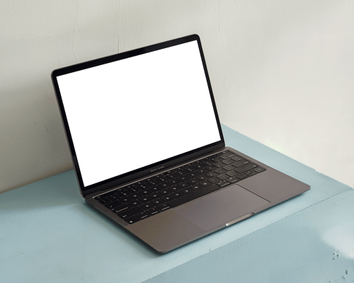 Sunlit Macbook Mockup On Pastel Blue Table Minimal And Trendy