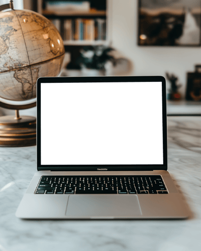 Modern Office Macbook Mockup On Marble Desk With Globe In Background
