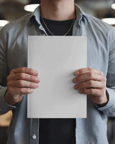 Casual Office Magazine Mockup Hands Holding In Modern Workspace Environment