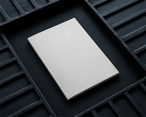 Dark Metallic Surface Magazine Mockup Angled Top View With Hard Shadows And Modern Industrial Atmosphere 0196