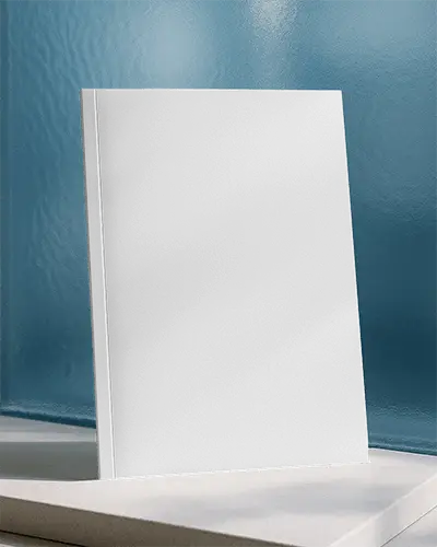 Sunlit Studio Magazine Mockup Upright On Textured Surface With Blue Background And Clean Natural Lighting 0199