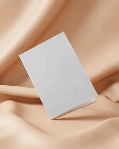 Softcover Magazine Mockup On Creased Peach Fabric Smooth Lighting Minimal And Elegant Presentation 0205