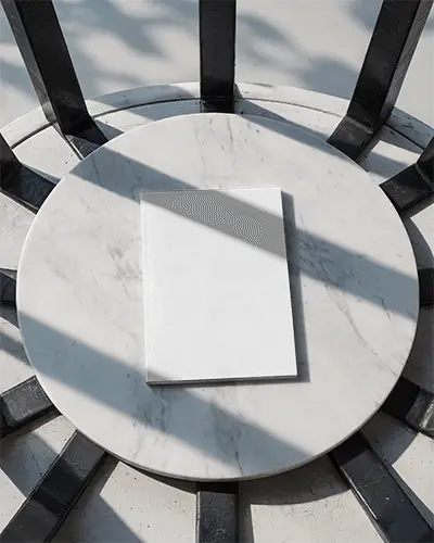 Minimalist Magazine Mockup Top View On Round Marble Table With Geometric Shadow Patterns And Natural Lighting 0206