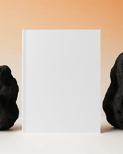 Upright Magazine Mockup On Light Surface Between Volcanic Rocks With Soft Gradient Orange Background 0232