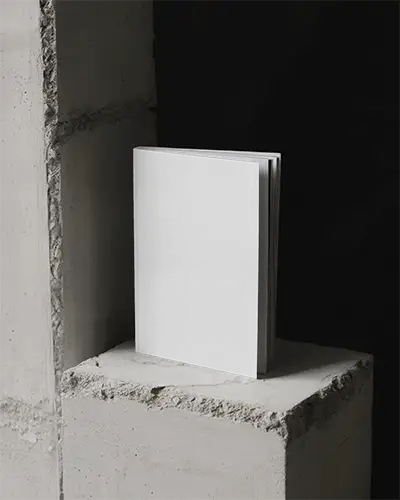 Minimalist Studio Magazine Mockup Vertical Cover Placement On Raw Concrete Block With Dark Background 0238