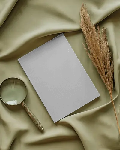 Nature Inspired Magazine Mockup On Soft Green Fabric With Dried Pampas Grass And Vintage Metal Magnifying Glass 0269