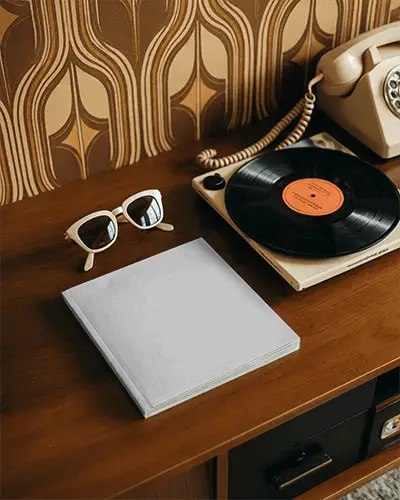 Modern Minimalist Magazine Mockup On Wooden Table With Vintage Record Player And Shades 0341