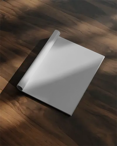 magazine-mockup-with-rolled-edge-on-textured-wooden-surface-for-design-display