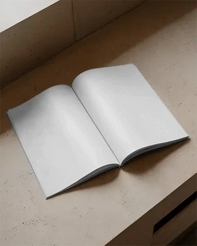 open-magazine-mockup-on-stone-surface-with-clean-layout-and-realistic-soft-shadow-light