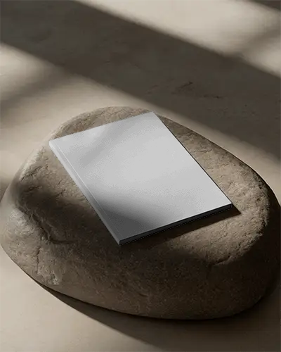 artistic-shadow-play-magazine-mockup-on-textured-stone-surface-for-modern-presentations