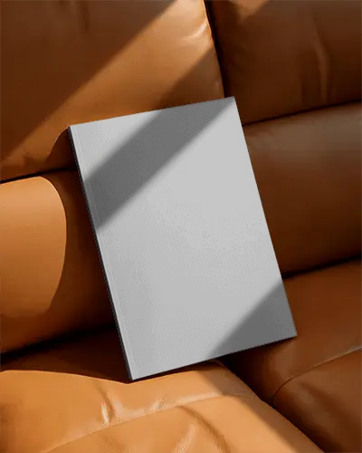 magazine-mockup-on-leather-sofa-with-natural-light-shadow-effect