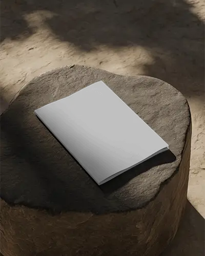 Minimal A4 Cover Magazine Mockup On Stone Surface Natural Sunlight