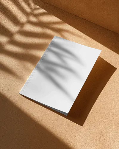 Magazine Mockup On Beige Surface With Tropical Shadow Overlay
