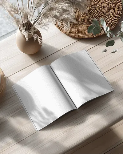 Open Spread Magazine Mockup On Minimalist Wooden Table With Nature Inspired Decor Elements