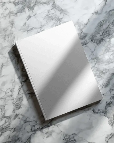 Hardcover Magazine Mockup Showing Top View On Marble Surface With Natural Light Shadow