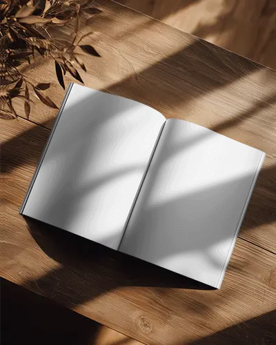 Elegant Open Magazine Mockup With Natural Light And Shadows Over Wooden Table