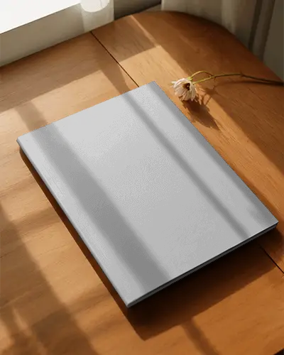 Elegant Hardcover Magazine Mockup On Wooden Table With Natural Light Shadow Effect