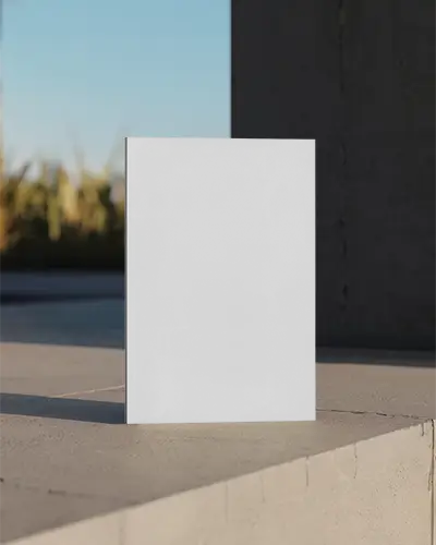 Hardcover Magazine Mockup On Concrete Surface With Natural Light Outdoor Setting