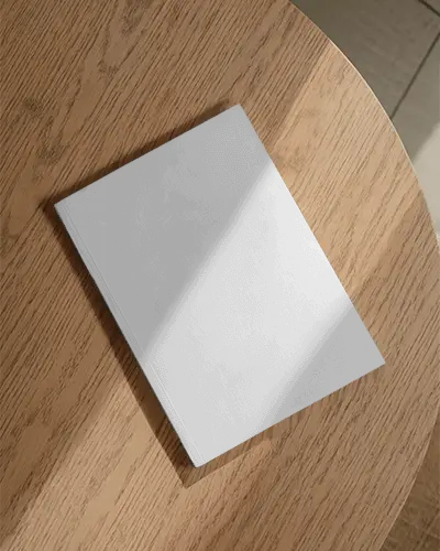 Minimalist Magazine Mockup On Wooden Table With Natural Light And Clean Layout Design