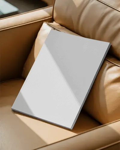 Realistic Magazine Mockup Digital Template On Modern Couch For Branding Showcase