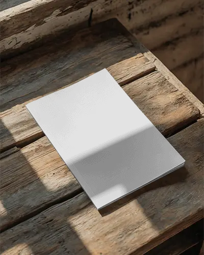 Sleek Minimalist Magazine Mockup On Rustic Wooden Surface With Natural Light Shadows