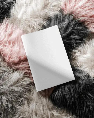 Modern Minimalist Magazine Mockup On Soft Furry Background Angled View For Design Showcase