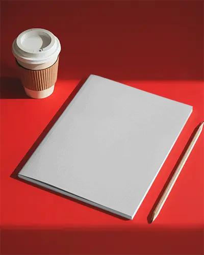 Premium Magazine Mockup With Coffee Cup And Pencil On Vibrant Background