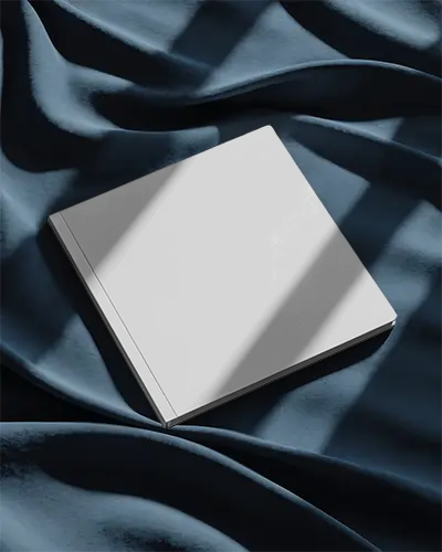 Sleek Minimalist Magazine Mockup On Soft Fabric With Natural Light Shadows