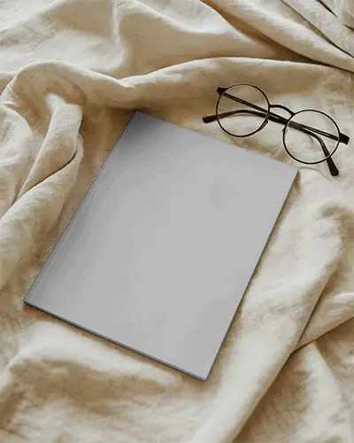 Realistic Magazine Mockup Flat Lay On Crumpled Textile With Eyewear For Design Presentation