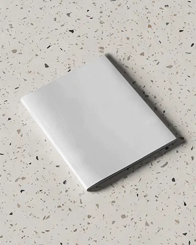 Premium Softcover Magazine Mockup On Textured Terrazzo Surface For Design Presentation