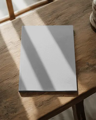 Hardcover Magazine Mockup On Rustic Wooden Surface With Natural Light Shadows