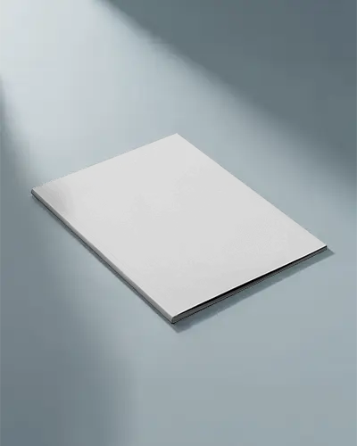 Minimalistic Magazine Mockup Display On Flat Surface With Subtle Lighting Effects