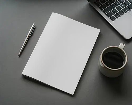 Professional Magazine Mockup On Workspace With Pen Coffee Cup And Laptop For Presentation