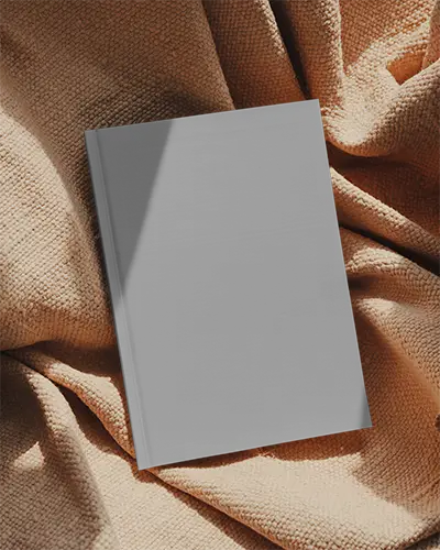 Hardcover Magazine Mockup On Textured Fabric Background For Creative Project Presentation