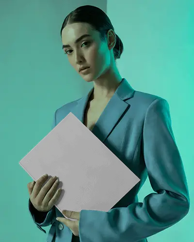 Teal Lit Fashion Portrait Magazine Mockup Held By Model Minimal Editorial Presentation