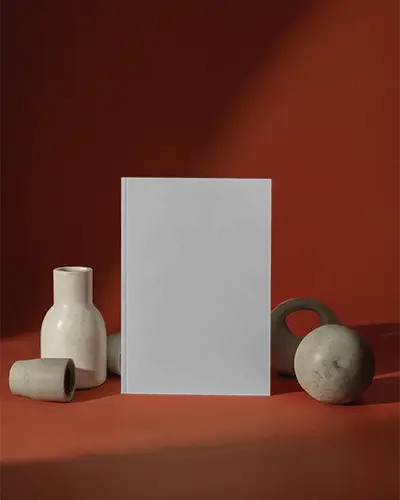 Luxury Red Still Life Magazine Mockup Centered With Ceramic Vases And Dramatic Editorial Shadows