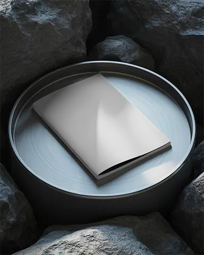 Premium Magazine Mockup On Metallic Round Platform Surrounded By Rocks For Design Display