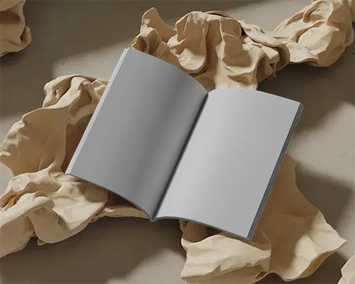 Elegant Open Magazine Mockup On Textured Fabric For Creative Content Presentation