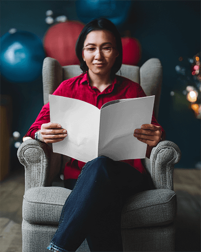 Modern Chair Magazine Mockup Female Model Enjoying Relaxed Setting