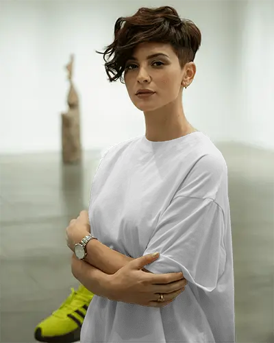 Trendy Fashion T Shirt Mockup Female Model Urban Style Short Haircut In Modern Gallery Background