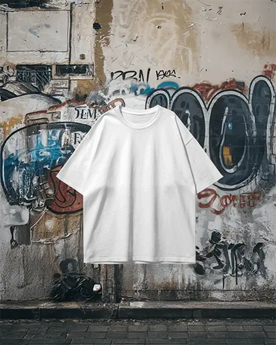 Front View White Boxy Tshirt Mockup Hanging On Weathered Graffiti Wall