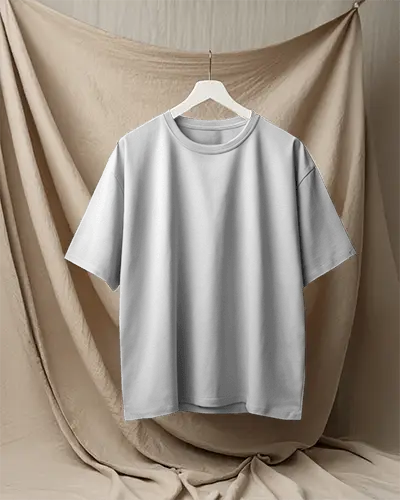 Boxy Blank White Round Neck Unisex T Shirt Mockup On Hanger Draped Fabric Background Soft Studio Lighting Minimal And Versatile Presentation