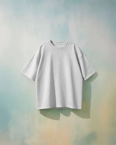 Boxy Blank White Round Neck Unisex T Shirt Mockup Front View On Hanger Colorful Gradient Wall Soft Shadow Playful Artistic Lighting