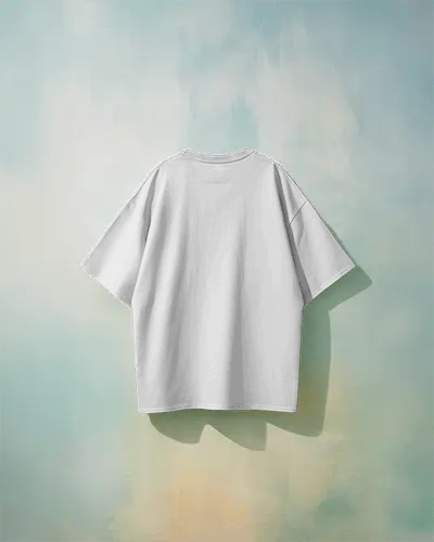 Boxy Blank White Round Neck Unisex T Shirt Mockup Front View On Hanger Colorful Gradient Wall Soft Shadow Playful Artistic Lighting