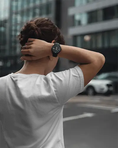 Urban Street Back View T Shirt Mockup Female Model In Blank White Round Neck