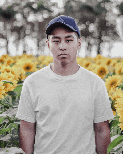 Man Tshirt Mockup Standing In Sunflower Garden