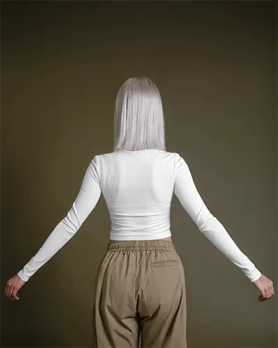 Clean White Long Sleeve T Shirt Template Back Print On Woman With Light Hair High Waist Pants Stylish Pose